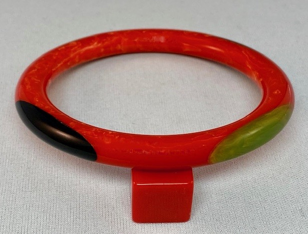 SZ8 Shultz marbled orange red tube bangle/oval dots